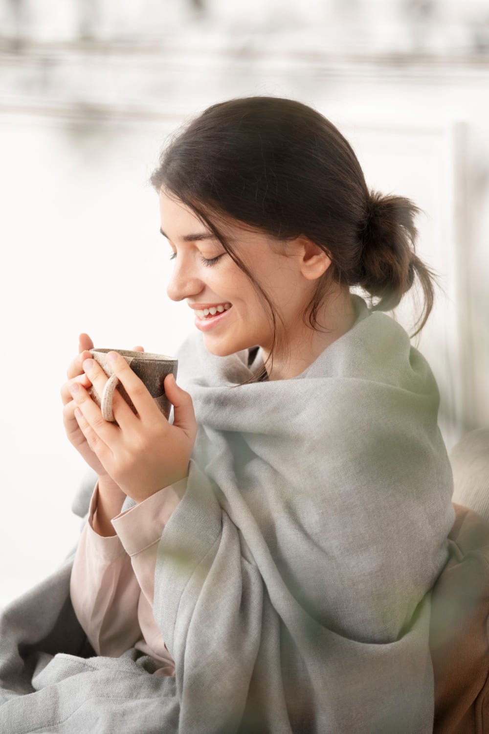 woman drinking tea happy